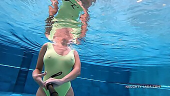 Sheer Swimsuit-Clad Wife Swims In Public Pool